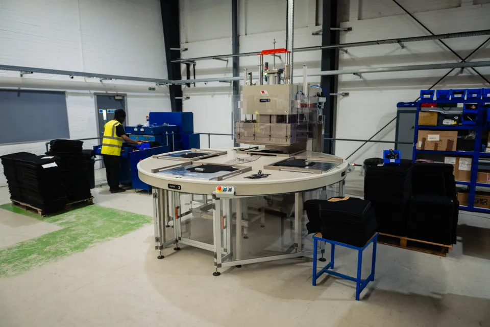 Mats and machinery on the Middleton Manufacturing workshop floor.
